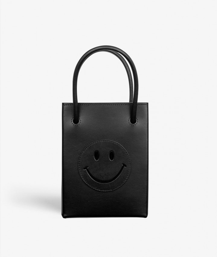 Essential Crossbody Laukku Smiley Vegetable Tanned Black